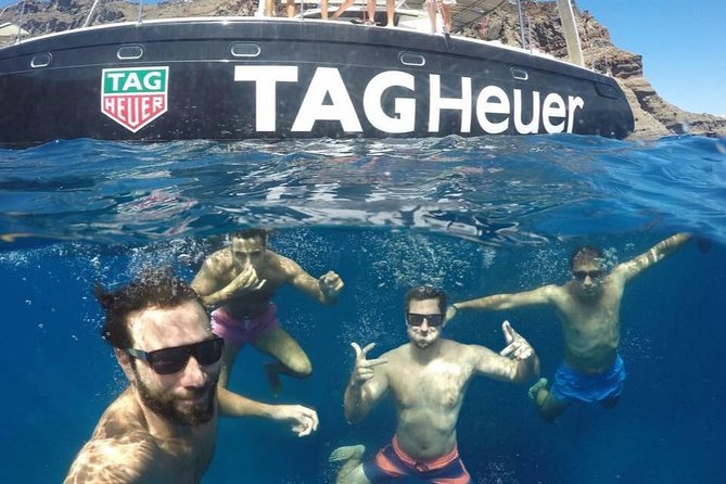 Santorini: Adventurous Catamaran Experience with Snorkeling - Price and what you get for $113