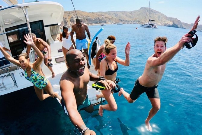 Santorini All-inclusive Catamaran Cruise with Thirassia Stop - Volcano tour without the hike: Palea Kameni views and Nea Kameni hot springs