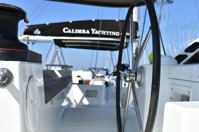 Santorini All-inclusive Private Catamaran Cruise - Akrotiri lighthouse, Black Mountain, and Indian Rock: scenic cruising with perspective