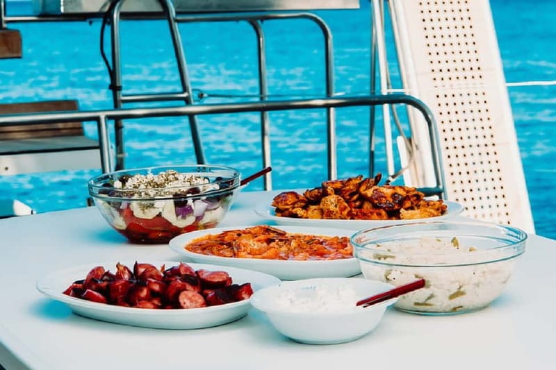Santorini: All-Inclusive Private Catamaran Experience - Cruising the caldera: Red Beach to White Beach and the “sea-level” view