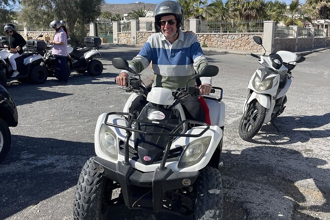 Santorini ATV Highlights Tour: Oia, Viewpoints & Volcanic Beaches - Perissa Black Sand Beach: volcanic textures and a quick breather