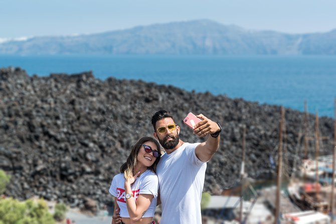 Santorini Caldera Cruise Tour (Volcano, Hot Springs, Thirassia) - Palea Kameni hot springs: swim distance, warm water expectations, and sulfur-stain tips