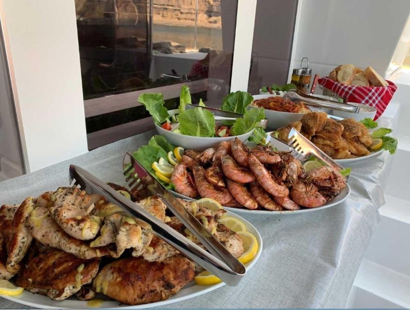Santorini: Caldera Cruise with Greek Meal and Transfer - A 5-hour Santorini cruise that turns the caldera into your plan