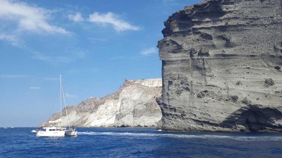Santorini: Caldera Cruise with Greek Meal and Transfer - The catamaran route: caldera cliffs, Red Beach, and White Beach