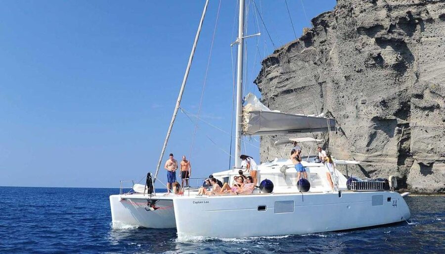 Santorini: Caldera Cruise with Greek Meal and Transfer - Lunch on board: Greek meal, drinks, and a reality check on expectations