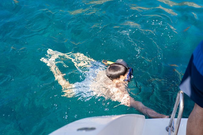 Santorini Caldera Gold Day Cruise with BBQ on board and Open Bar - Sailing around the volcano, then swimming at Nea Kameni