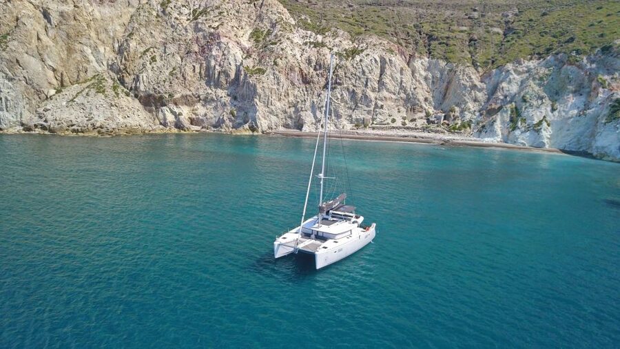 Santorini: Caldera Luxury Catamaran Cruise w/ Meal & Drinks - Luxury catamaran comfort, with pickup that saves you time