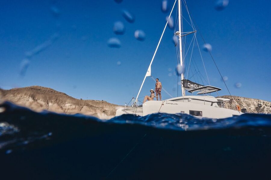 Santorini: Caldera Luxury Catamaran Cruise w/ Meal & Drinks - Red Beach and White Beach stops: quick, iconic, and photo-friendly