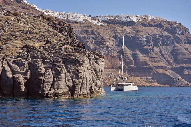 Santorini: Caldera Private Catamaran Cruise with Meal & Drinks - Daytime vs sunset departures: picking the light and the mood