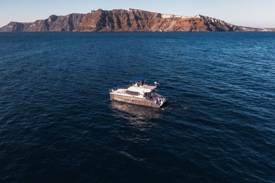 Santorini: Caldera Private Power Catamaran Cruise - White Beach and Red Beach: where the photos meet the swim