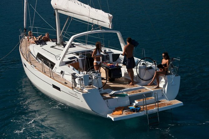 Santorini Caldera Private Sailing Boat Cruise - White Beach: a boat-only feeling with crystal-clear water