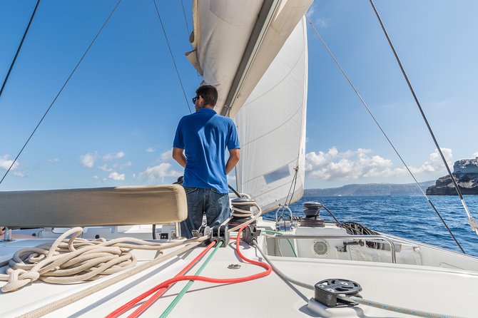 Santorini Caldera Sailing Tour with BBQ Lunch and Drinks - Entering Santorini by Water: Day or Sunset Catamaran Energy