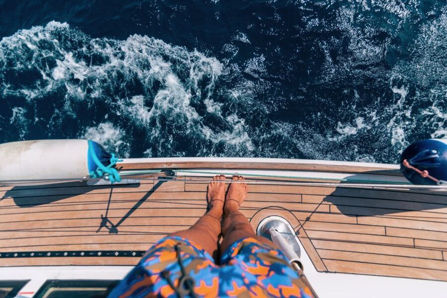 Santorini Caldera: Sunset Sailing Cruise with Meal - Akrotiri Lighthouse and the Run Toward the Volcanic Core