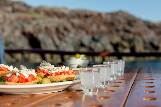 Santorini Caldera Sunset Traditional Cruise with Meal and Drinks - Dinner onboard: the Greek meal detail that makes the day feel complete