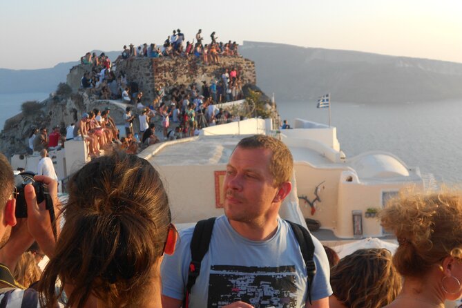 Santorini car tour with a local - Perivolos Beach: black sand, one-hour reset, and swim-ready timing