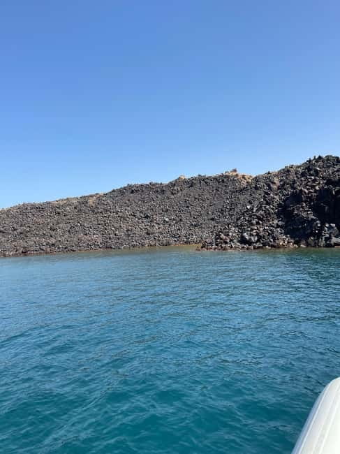 Santorini: Catamaran Cruise with Food and Drinks - Drinks, music, and the human touch that makes the day feel easy