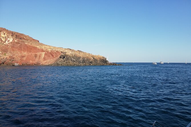 Santorini Catamaran Cruise with Fresh Meal and Open Bar - Hotel pickup and the real timetable behind a 5-hour Santorini cruise