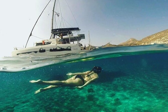 Santorini Catamaran Cruise with Fresh Meal and Open Bar - Palea Kameni Hot Springs: warm sulfur swimming by the volcano