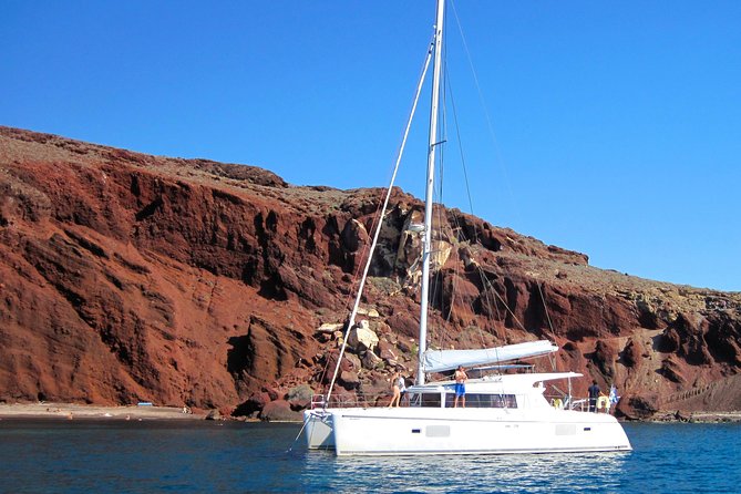 Santorini Catamaran Cruise with Fresh Meal and Open Bar - Sailing around the still-active volcano near Nea Kameni
