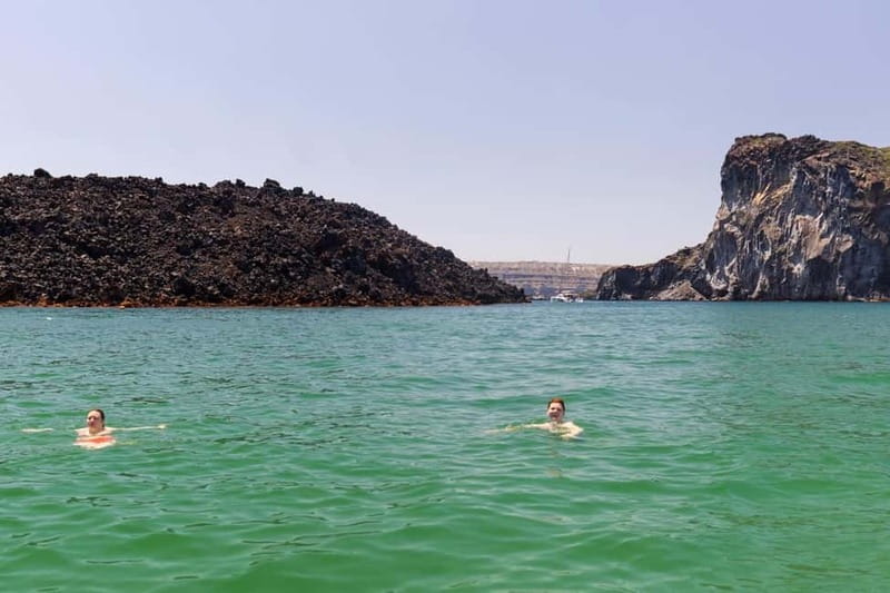 Santorini: Catamaran Cruise with Fresh Meal & Open Bar - The volcano photo stop, plus snorkeling and swimming options