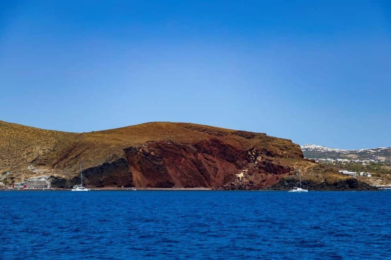 Santorini: Catamaran Cruise with Fresh Meal & Open Bar - Red Beach, White Beach, and the sea-level caldera effect