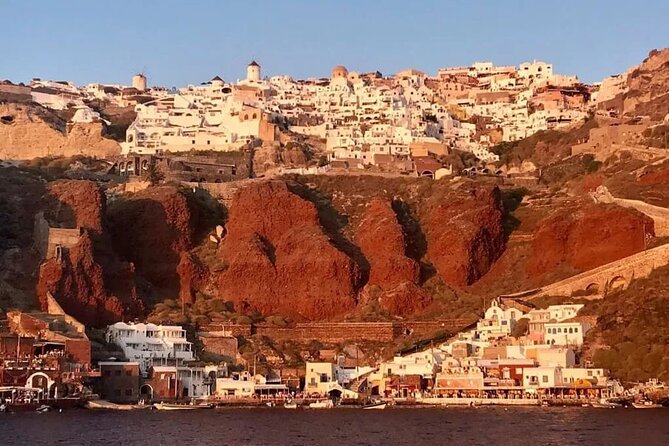 Santorini Catamaran Cruise with Greek Meal, Open-Bar and Sunset - South Coast Sightseeing: Lighthouse, Caldera Rims, and Beaches By Name