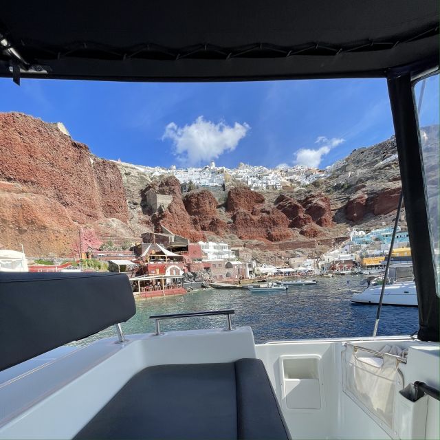 Santorini: Catamaran Cruise with Lunch, Drinks, & Oia Visit - Thirassia swim and snorkel, plus Red and White Beach time