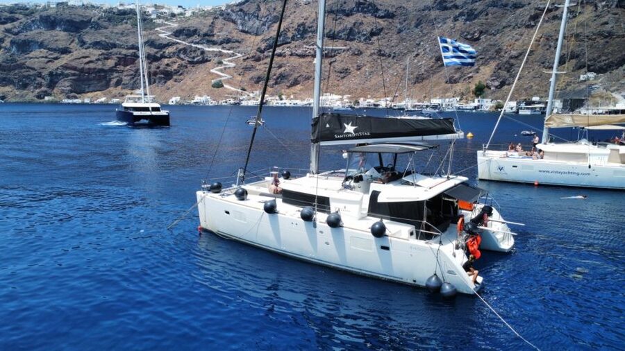 Santorini: Catamaran Cruise with Lunch, Drinks, & Oia Visit - Akrotiri lighthouse, Indian Rocks, and the built-in photo beats