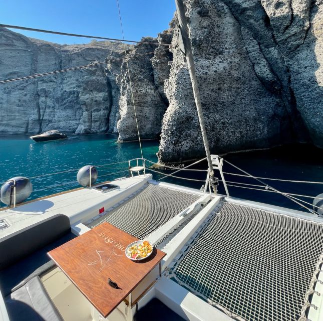 Santorini Catamaran Cruise with Swimming, Meal and Open Bar - Should you book this catamaran cruise from Vlychada?