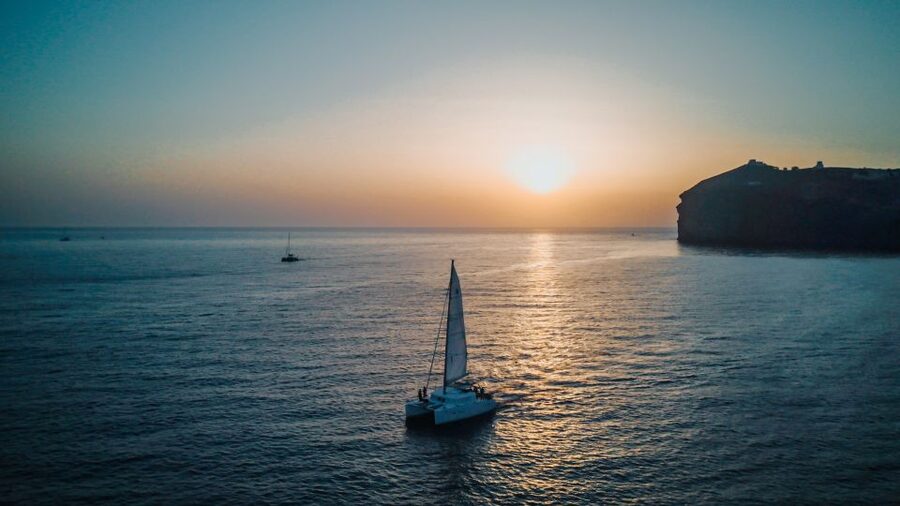 Santorini Catamaran Cruise with Swimming, Meal and Open Bar - Thirassia main stop: snorkeling time plus a proper on-board meal