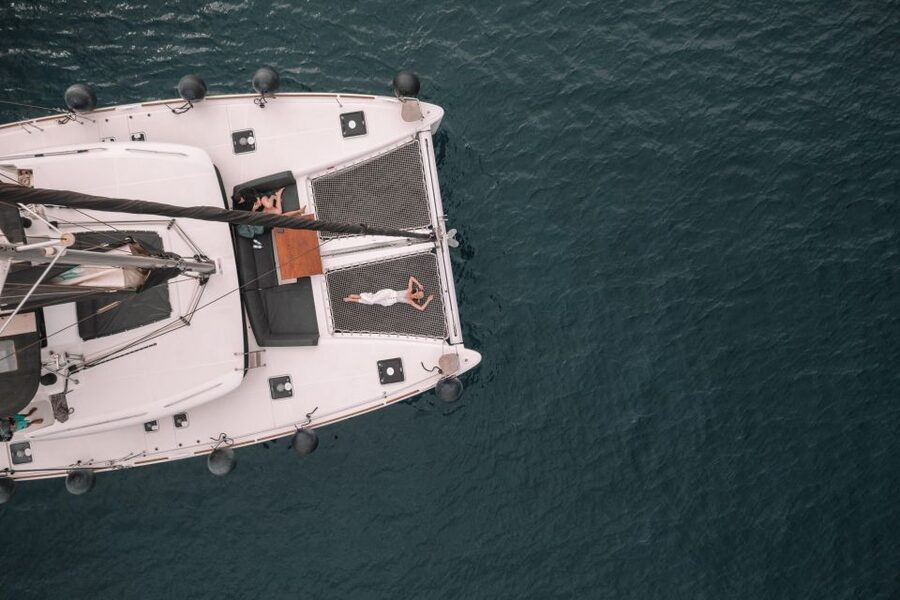 Santorini Catamaran Cruise with Swimming, Meal and Open Bar - Red Beach and White Beach: quick swimming stops with big payoff