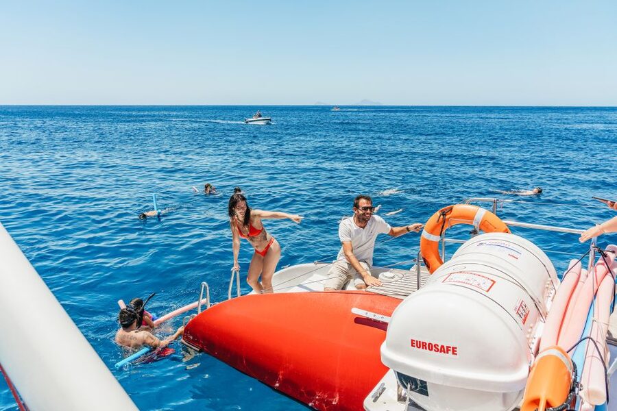 Santorini: Catamaran Tour with BBQ Dinner, Drinks, and Music - Key highlights worth planning around