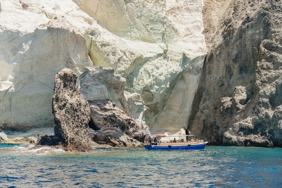 Santorini: Catamaran Tour with BBQ Dinner, Drinks, and Music - Music onboard: fun energy without going full party