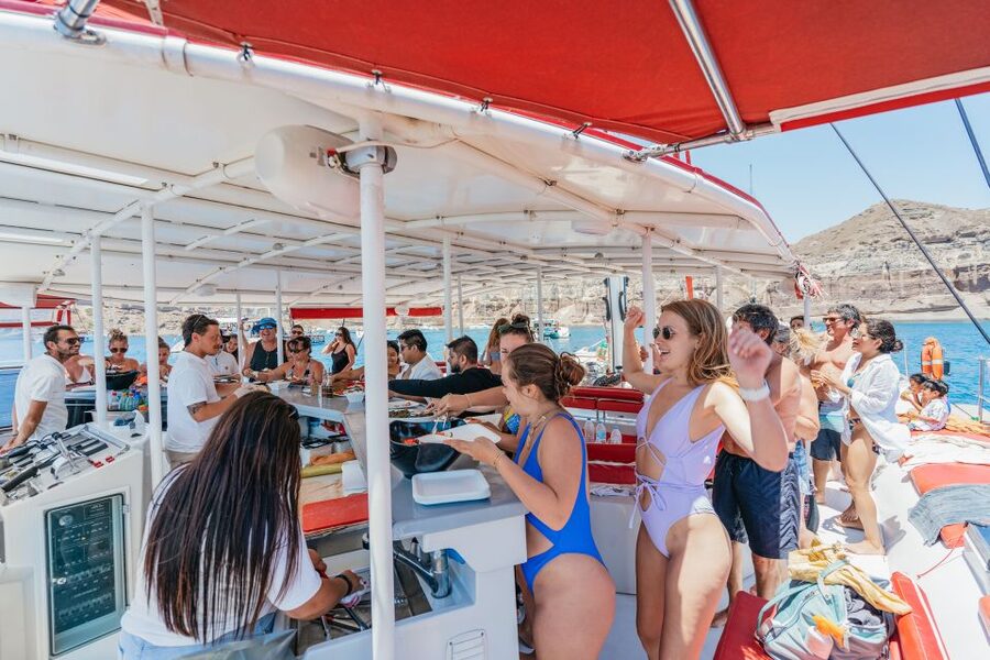 Santorini: Catamaran Tour with BBQ Dinner, Drinks, and Music - Sunset option: caldera sailing and the light change