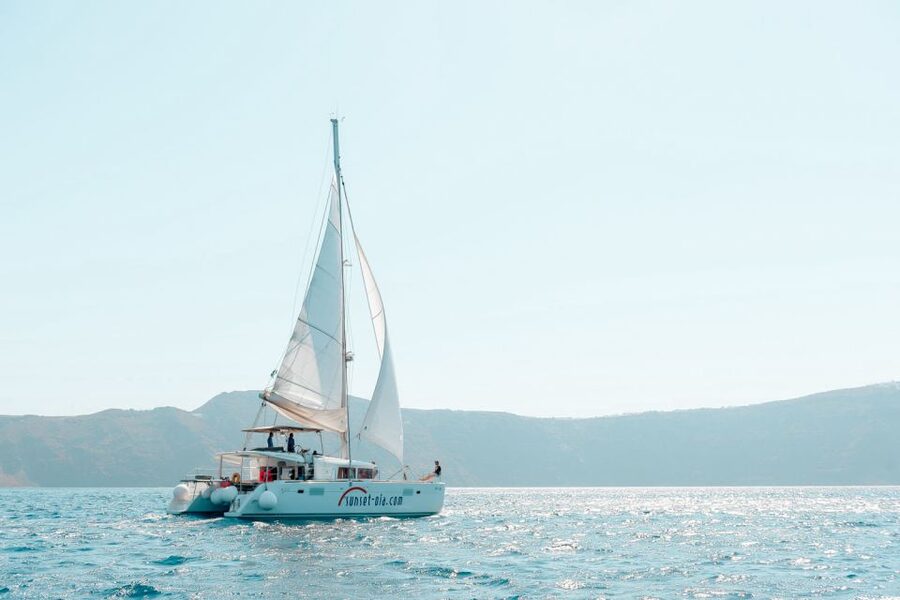 Santorini: Catamaran Tour with BBQ Meal and Unlimited Drinks - Red Beach Snorkeling: What You Can Expect (and What You Should Not)