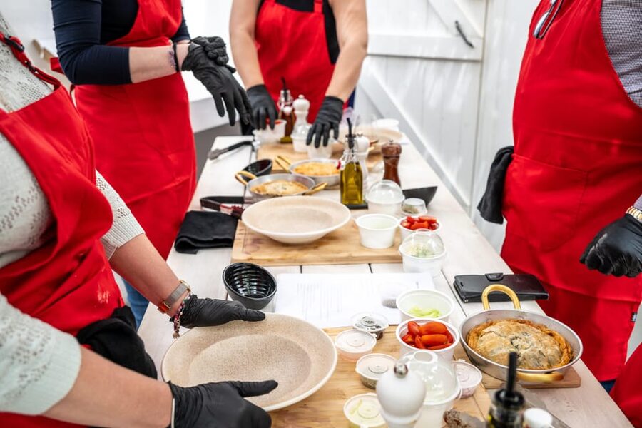 Santorini: Cooking Class with Lunch and Wine Tasting - Kamari’s Black Beach setting turns cooking class into real Santorini