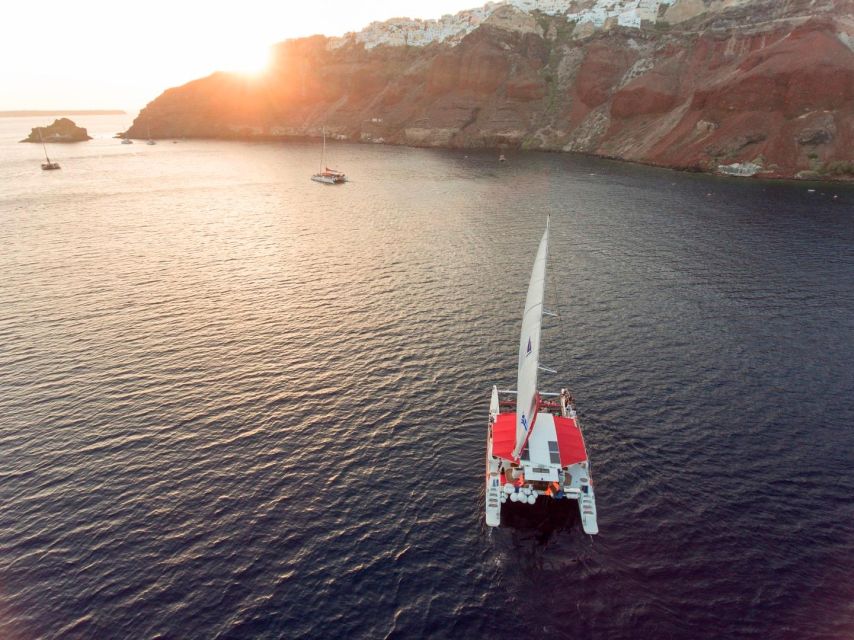 Santorini: Cruise Catamaran with BBQ & Drinks Day or Sunset - Oia Sunset From the Water, Plus Scenic Sailing Below Fira