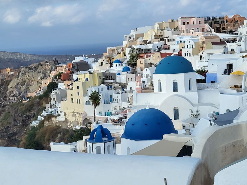 Santorini: Customizable Private Island Day Tour - Oia sunset, blue-domed views, and the staircase reality