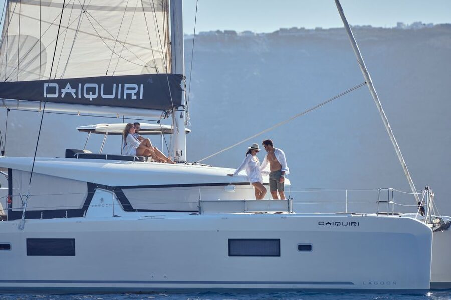 Santorini: Day Luxury Catamaran Cruise with Meal & Drinks - From hotel pickup to catamaran calm: how the day is paced