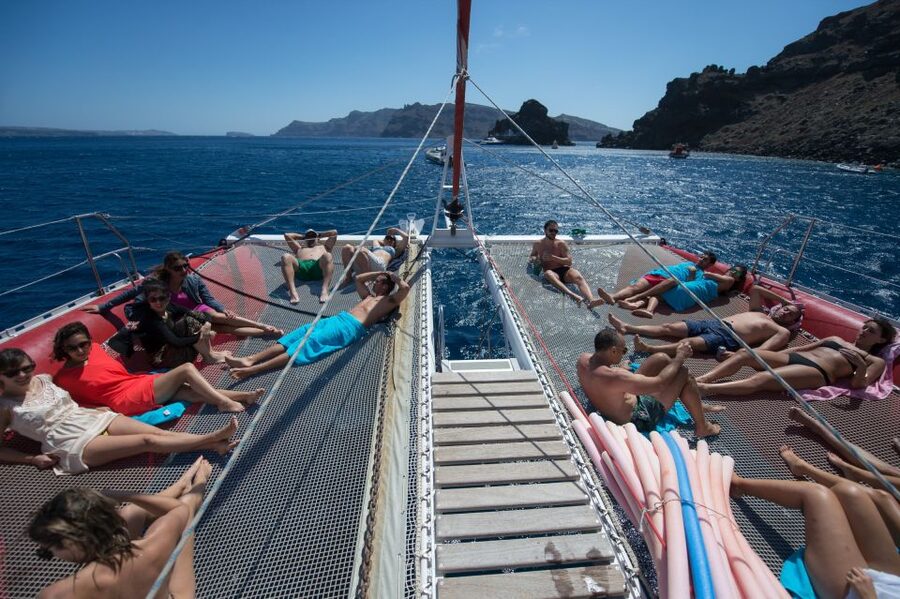 Santorini: Dream Catcher 5-hour Sailing Trip in the Caldera - Akrotiri views and the Red and White Beach approach