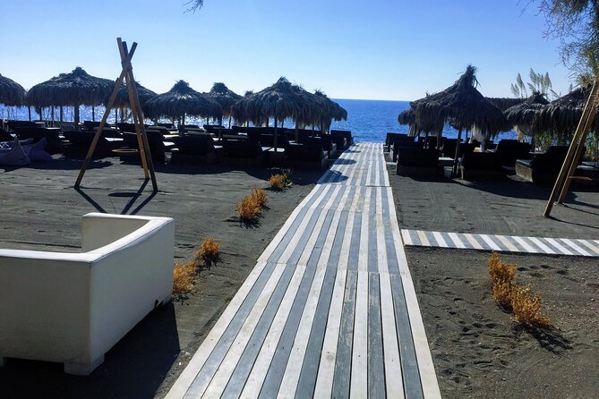 Santorini Driver for Hire Private Transfer - Megalochori’s village square churches: a classic Santorini pause