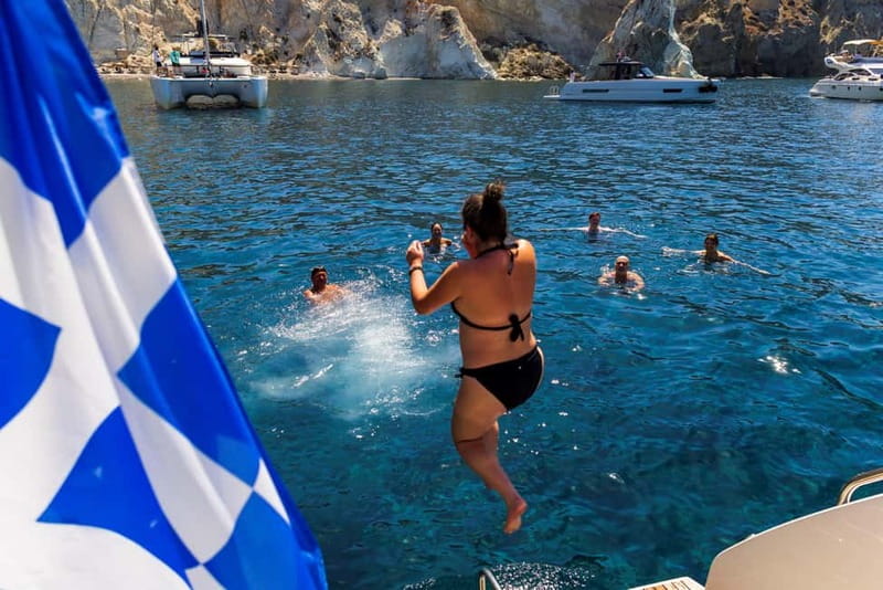 Santorini: Exclusive Private Cruise for a Luxurious Escape - Red Beach from sea level: photos first, sandals last