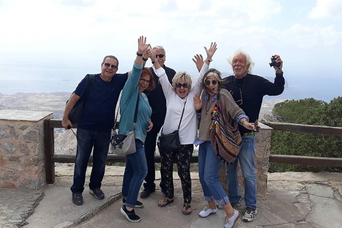 Santorini First-time Visitors Private Tour with Wine Tasting - Oia main street, iconic churches, and the timing of sunset