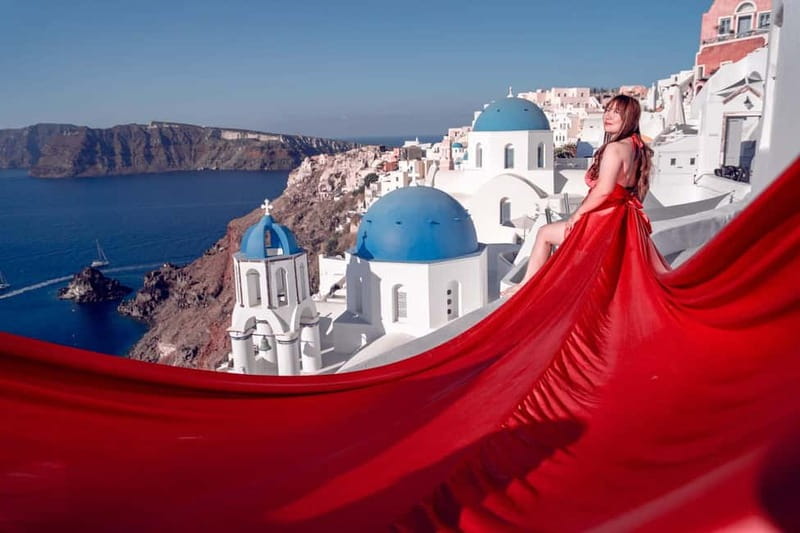 Santorini: Flying Dress Photoshoot Private Entry to Blue Dom - Why this Flying Dress shoot works so well in Santorini