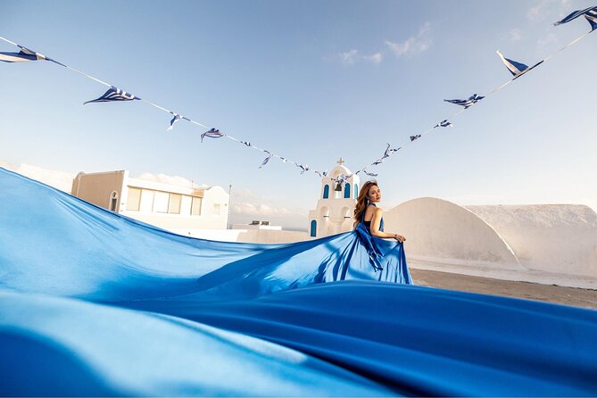 Santorini: Flying Dress Professional Photography <em>Dress Included</em> – Key Highlights You’ll Feel Immediately’ /></p>
<ul>
<li><strong>Flying dress styling is included</strong>, with dress selection handled by email after booking</li>
<li><strong>Pro posing help and angles</strong>, so you spend less time guessing and more time shooting</li>
<li><strong>3-hour option covers up to 3 villages</strong>, with pickup and drop-off included</li>
<li><strong>You get a finished set</strong>: 35 to 70 edited photos plus 2 to 3 phone videos</li>
<li><strong>Private group experience</strong>, so your time stays your time</li>
<li><strong>Santorini sun tips are practical</strong>, like wearing comfy shoes and planning for heat</li>
</ul>
<div class="twil" style="margin: 20px 0; padding: 15px 0;"><p>More flying-dress shoots above the caldera:</p><ul style="margin: 10px 0; padding: 0; list-style: none; display: grid; grid-template-columns: repeat(auto-fill, minmax(250px, 1fr)); gap: 14px;"><li style="border: 1px solid #e5e5e5; border-radius: 8px; overflow: hidden; line-height: 1.4; background: #fff;"><a href="https://thesantorinitraveler.com/santorini-2h-private-flying-dress-photoshoot-with-transportation/" aria-hidden="true" tabindex="-1"><img decoding="async" style="width: 100%; height: 150px; object-fit: cover; display: block;" src="https://photos.thesantorinitraveler.com/wp-content/uploads/santorini-2h-private-flying-dress-photoshoot-with-transportation-400x267.jpg" alt="" loading="lazy"></a><div style="padding: 10px 12px;"><a href="https://thesantorinitraveler.com/santorini-2h-private-flying-dress-photoshoot-with-transportation/" style="font-weight: 600;">Santorini 2h Private Flying Dress Photoshoot with Transportation</a><br><span style="font-size: 0.82em; color: #555; margin-top: 4px;"><span style="color: #E2683C;">★</span> 5.0 &middot; 357 reviews</span></div></li><li style="border: 1px solid #e5e5e5; border-radius: 8px; overflow: hidden; line-height: 1.4; background: #fff;"><a href="https://thesantorinitraveler.com/exclusive-santorini-flying-dress-photoshoot-with-pickup/" aria-hidden="true" tabindex="-1"><img decoding="async" style="width: 100%; height: 150px; object-fit: cover; display: block;" src="https://photos.thesantorinitraveler.com/wp-content/uploads/exclusive-santorini-flying-dress-photoshoot-with-pickup-400x267.jpg" alt="" loading="lazy"></a><div style="padding: 10px 12px;"><a href="https://thesantorinitraveler.com/exclusive-santorini-flying-dress-photoshoot-with-pickup/" style="font-weight: 600;">Exclusive Santorini Flying Dress Photoshoot with Pickup</a><br><span style="font-size: 0.82em; color: #555; margin-top: 4px;"><span style="color: #E2683C;">★</span> 4.5 &middot; 336 reviews</span></div></li><li style="border: 1px solid #e5e5e5; border-radius: 8px; overflow: hidden; line-height: 1.4; background: #fff;"><a href="https://thesantorinitraveler.com/flying-dress-photoshoot-in-santorini-by-flying-dress-photo/" aria-hidden="true" tabindex="-1"><img decoding="async" style="width: 100%; height: 150px; object-fit: cover; display: block;" src="https://photos.thesantorinitraveler.com/wp-content/uploads/flying-dress-photoshoot-in-santorini-by-flying-dress-photo-400x267.jpg" alt="" loading="lazy"></a><div style="padding: 10px 12px;"><a href="https://thesantorinitraveler.com/flying-dress-photoshoot-in-santorini-by-flying-dress-photo/" style="font-weight: 600;">Flying Dress Photoshoot in Santorini by Flying Dress Photo ©</a><br><span style="font-size: 0.82em; color: #555; margin-top: 4px;"><span style="color: #E2683C;">★</span> 5.0 &middot; 137 reviews</span></div></li><li style="border: 1px solid #e5e5e5; border-radius: 8px; overflow: hidden; line-height: 1.4; background: #fff;"><a href="https://thesantorinitraveler.com/flying-dress-photo-photoshoot-in-santorini-express-package/" aria-hidden="true" tabindex="-1"><img decoding="async" style="width: 100%; height: 150px; object-fit: cover; display: block;" src="https://photos.thesantorinitraveler.com/wp-content/uploads/flying-dress-photo-photoshoot-in-santorini-express-package-400x267.jpg" alt="" loading="lazy"></a><div style="padding: 10px 12px;"><a href="https://thesantorinitraveler.com/flying-dress-photo-photoshoot-in-santorini-express-package/" style="font-weight: 600;">Flying Dress Photo © Photoshoot in Santorini: Express Package</a><br><span style="font-size: 0.82em; color: #555; margin-top: 4px;"><span style="color: #E2683C;">★</span> 5.0 &middot; 110 reviews</span></div></li></ul></div><h2 id="why-a-flying-dress-shoot-works-so-well-in-santorini">Why a Flying Dress Shoot Works So Well in Santorini</h2>
<p><img width="669" height="446" decoding="async" src=