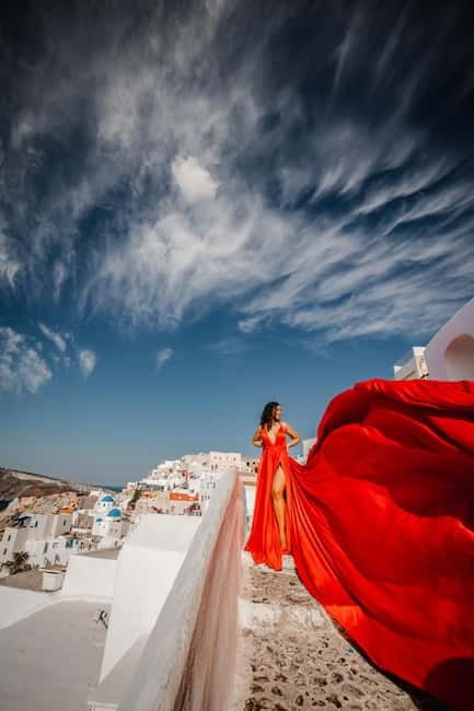 Santorini:Flying Dress shoot with Professional photographer - Flying dress photos in Oia: the idea that actually works