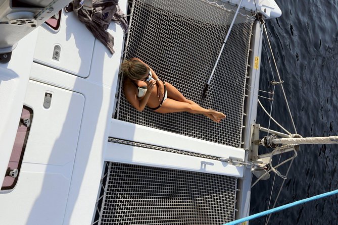 Santorini Full Day Catamaran Private Cruise incl. Meal, Drinks & Free Transport - Getting to Vlihada Port: pickup times, the one rule you cannot break
