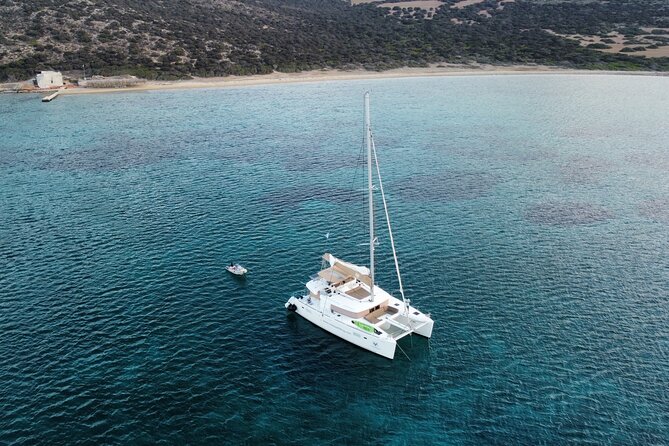 Santorini Gold Catamaran Cruise with BBQ, Drinks and Hotel Pickup - Food and drinks: unlimited bar is fun, but plan hydration like a pro