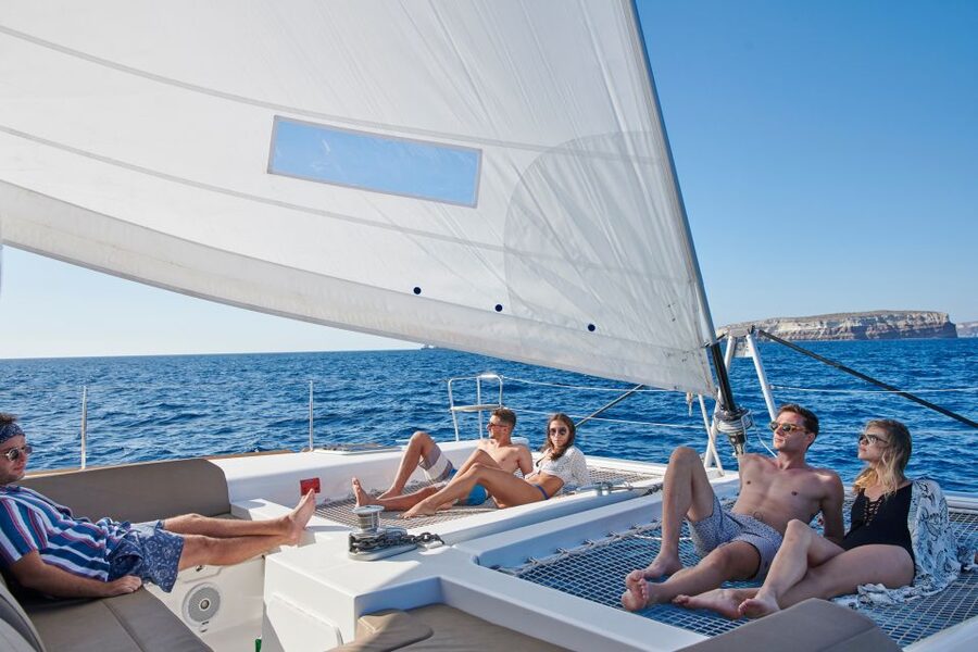 Santorini Gold Catamaran Cruise with Snorkel, BBQ & Open Bar - Comfort on Board: Catamaran Space, Safety Gear, and Real Practicalities