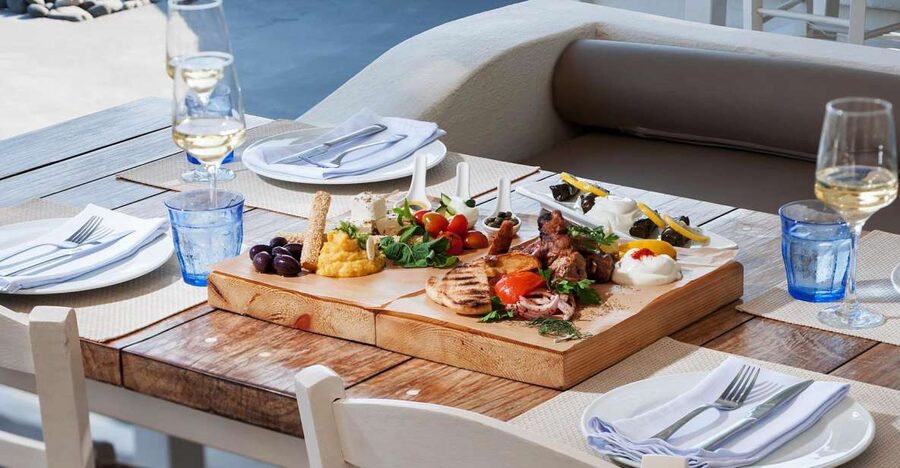 Santorini: Greek Food & Wine Tasting Tour - Small group energy, comfortable transport, and the pickup reality